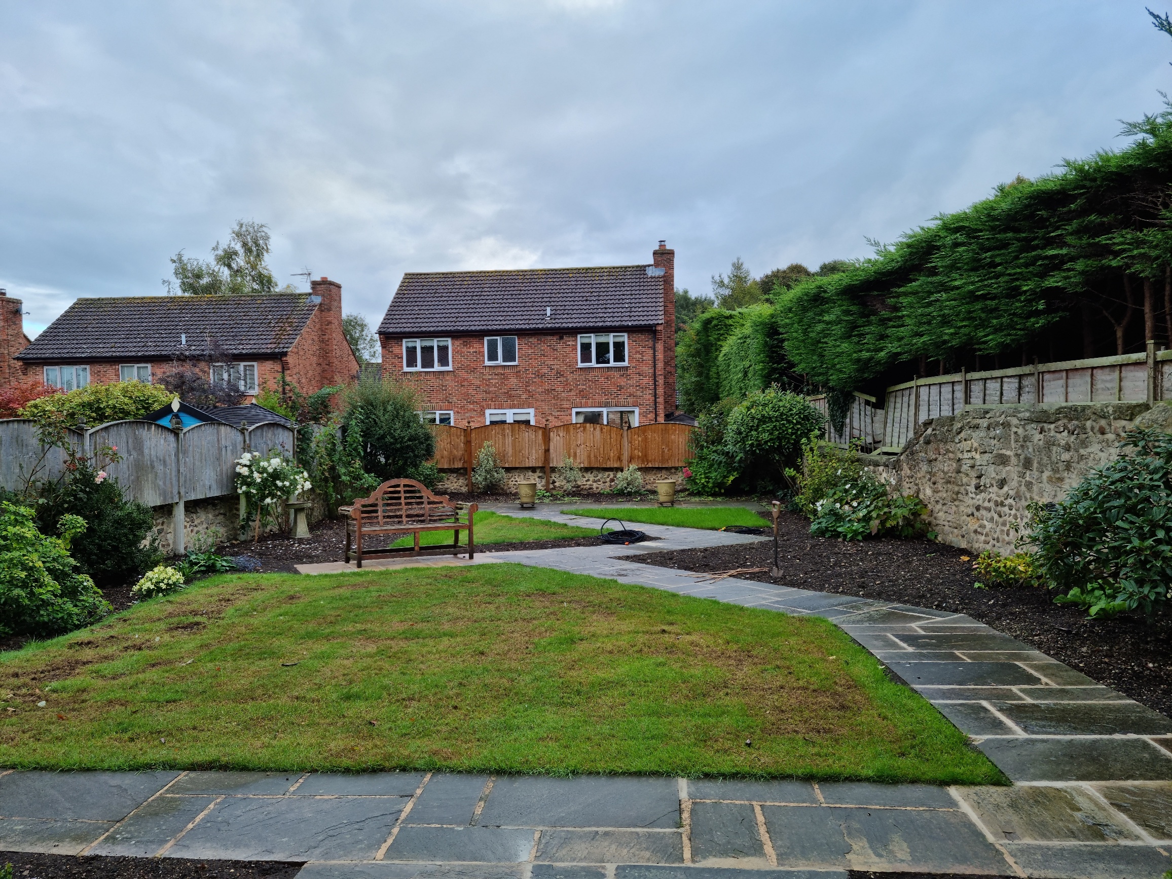 Exposed garden in need of structure